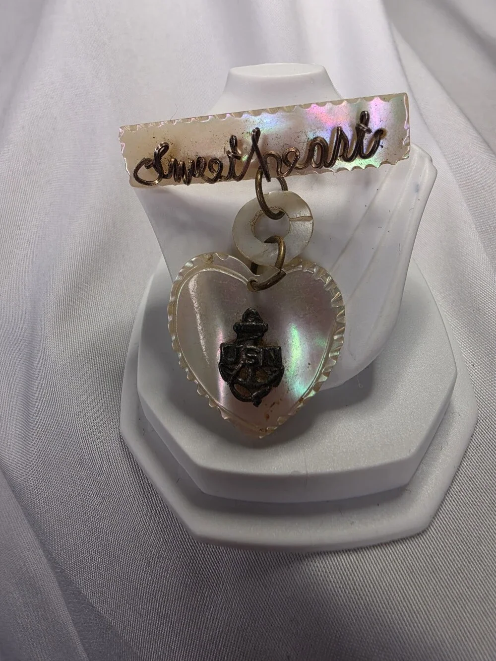 Vintage World War II-era U.S. Navy sweetheart brooch, made from carved MOP